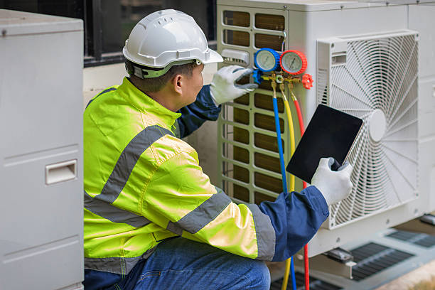 Professional Hvac technician working in Hallsville, MO